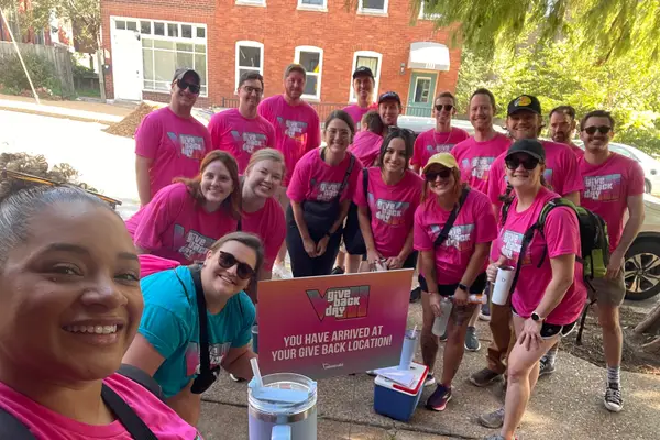 Volunteers arriving at their Give Back Day location