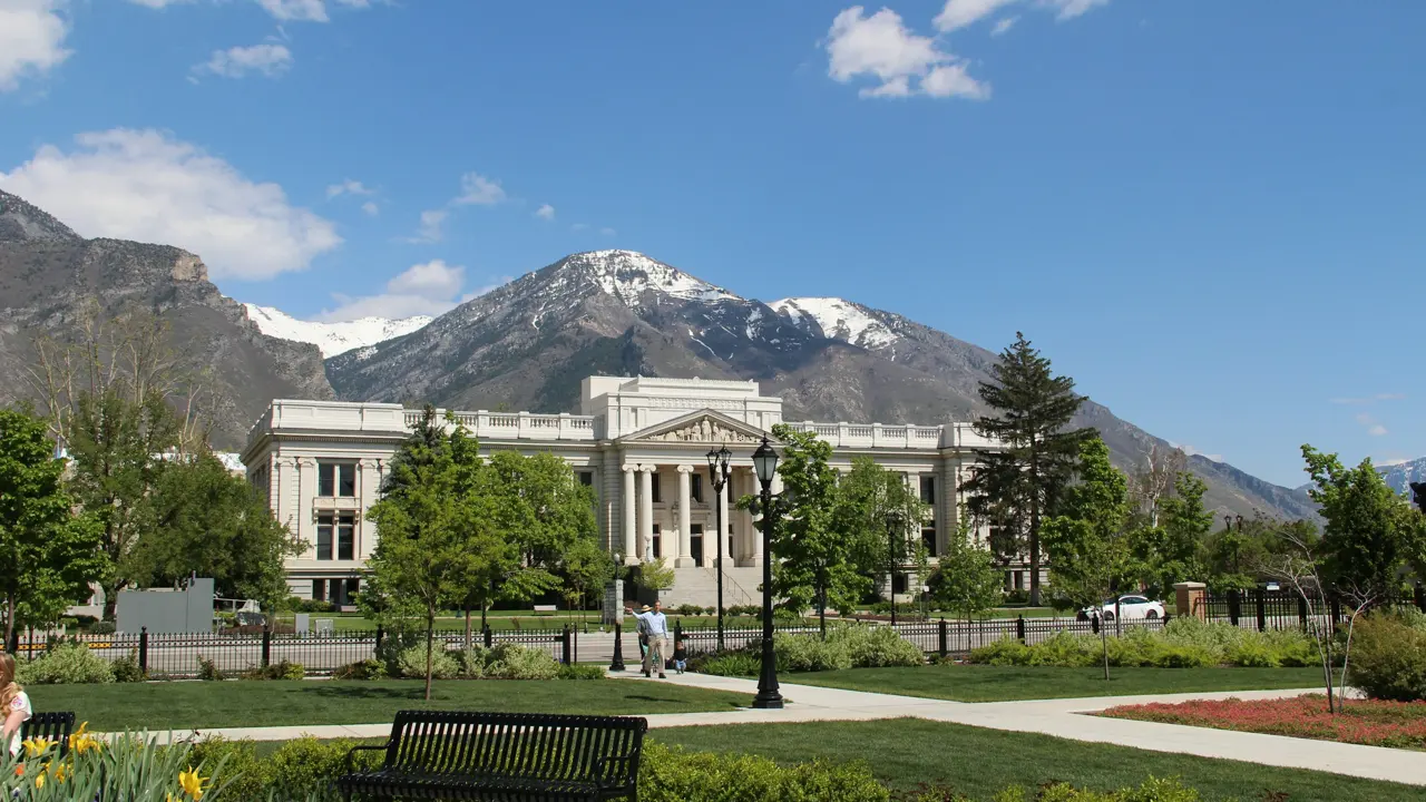 Historic civic building in downtown Provo with the Wasatch Range behind